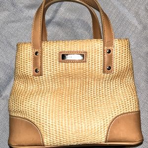 Nine West purse. Small. Hand bag but has the long strap also. Used
